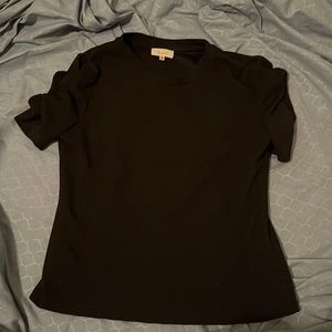 Versatile black top with scrunched sleeve!